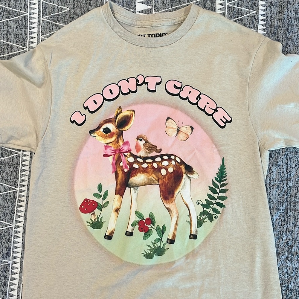 Hot topic graphic tee with “I don’t care”